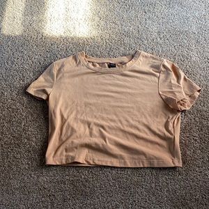 tan cropped t-shirt